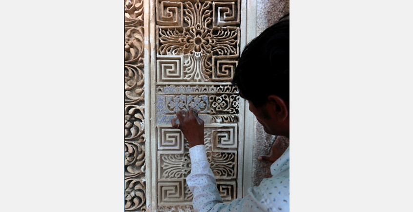 Intricate lime stucco ornamentation on the facades was skil fully restored by master crafts people.